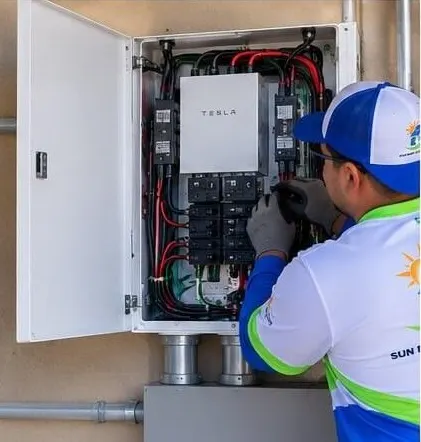 Electrician wiring a new main service panel