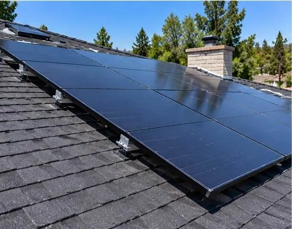 Solar panels installed on a shingle roof